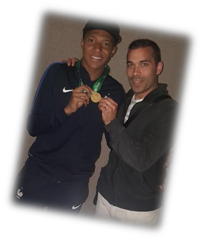 Reda Hammache with a young medal-winning player
